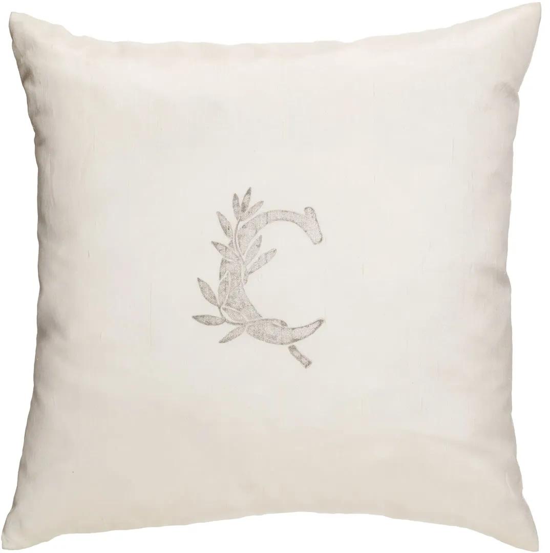 Cuscino decorativo con C stampata oro