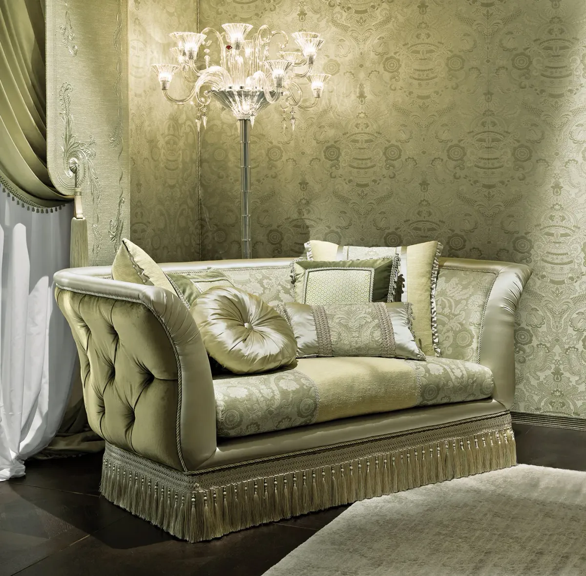 Antigua armchair with capitonnè back