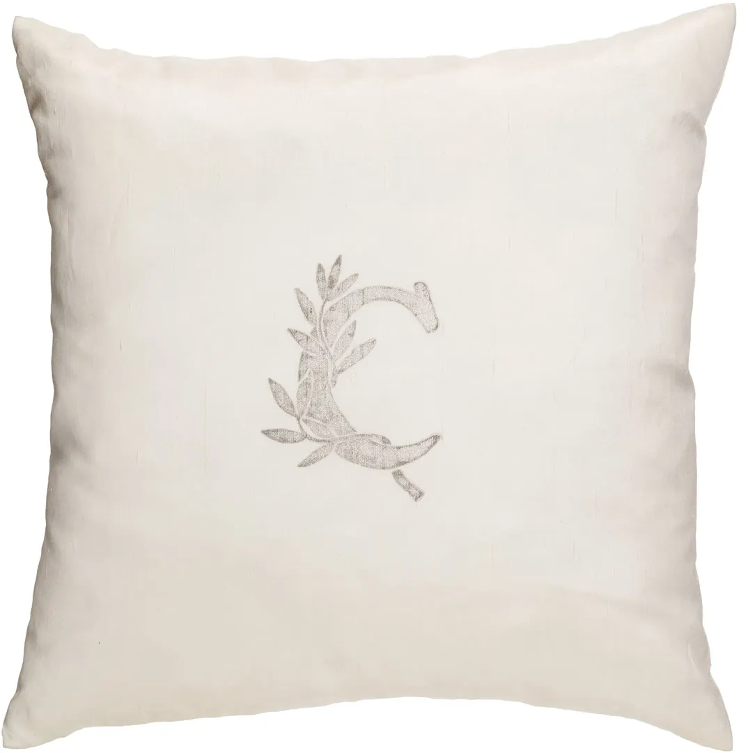 Cuscino decorativo con C stampata oro